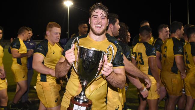 GOLD COAST, AUSTRALIA - MAY 04: Fraser McReight of Australia celebrates with the trophy after winning the Oceania Rugby U20 Championship match between Australia and New Zealand U20 at Bond University on May 04, 2019 in Gold Coast, Australia. (Photo by Albert Perez/Getty Images)