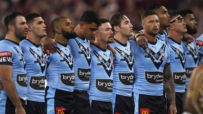 The Blues sing the national anthem before game one of the 2021 State of Origin series (Photo by Ian Hitchcock/Getty Images)