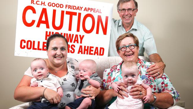 Fiona Lally with mother Trish Bromley, Marcus Bromley and triplets Zac, Ashton and Isabelle at six months old. Picture: Ian Currie