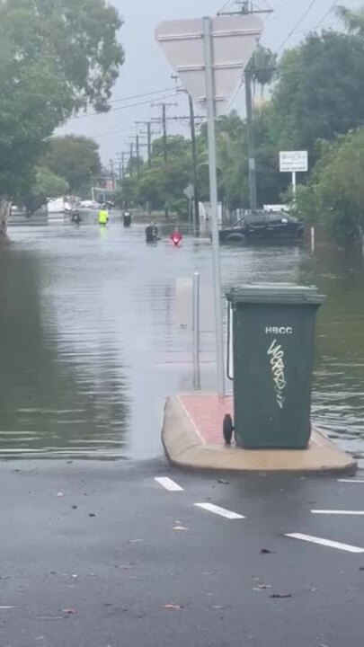 Wading through floodwaters