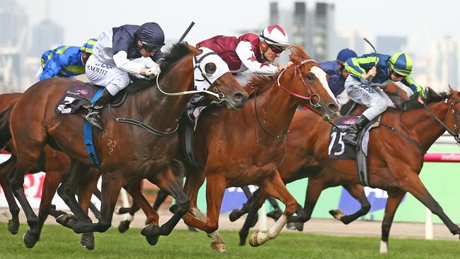 MELBOURNE, AUSTRALIA - MARCH 05: Mark Zahra riding Palentino beats Craig Newitt riding Tarzino (NZ) to win race 7 the Australian Guineas during Melbourne Racing at Flemington Racecourse on March 5, 2016 in Melbourne, Australia. (Photo by Scott Barbour/Getty Images for VRC)