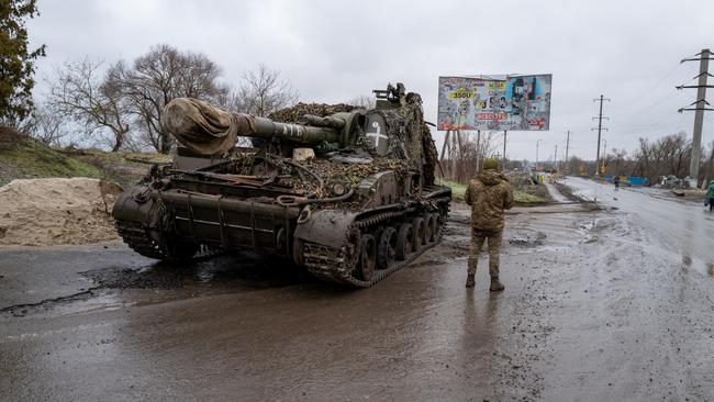 A Ukrainian tank sits along a street in the town of Kupiansk which has experienced regular shelling from the Russians. Picture: Getty