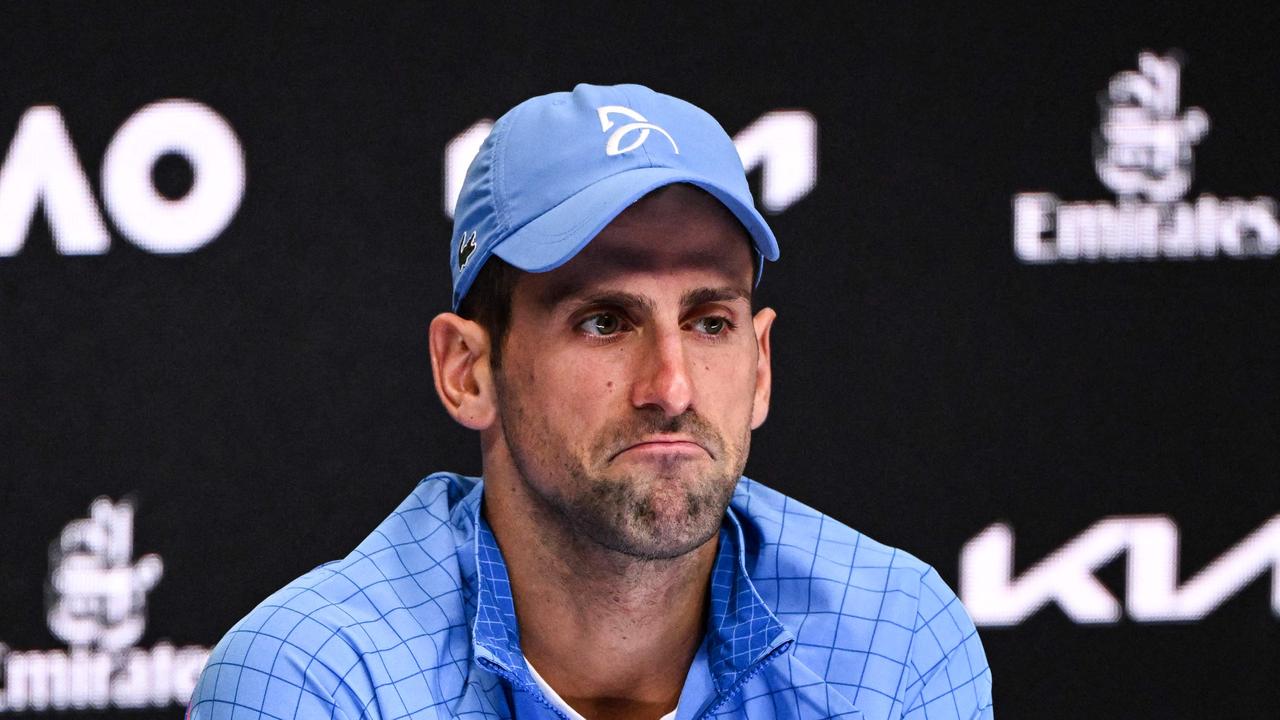 Serbia's Novak Djokovic gives a press conference after his semi-final. Photo by WILLIAM WEST / AFP.