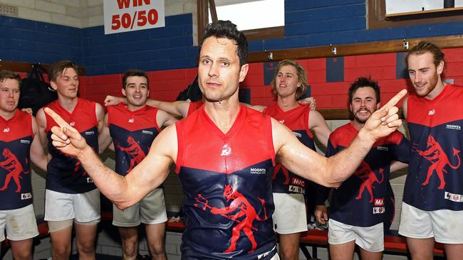 Gavin Wanganeen makes a comeback to footy playing for Moonta against Wallaroo at Moonta Oval. Pictured singing the song after the team's big win. Picture: Tom Huntley