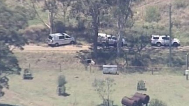 Police on the scene of the incident involving a man with a rifle east of Esk. Picture: Channel 9