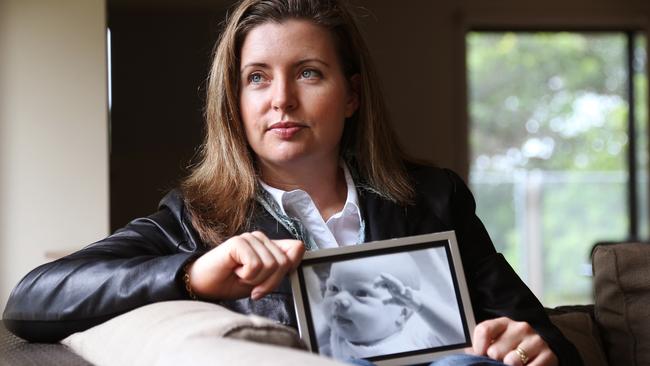 Toni McCaffery at her home in Lennox Head on the NSW North Coast with a picture of Dana.