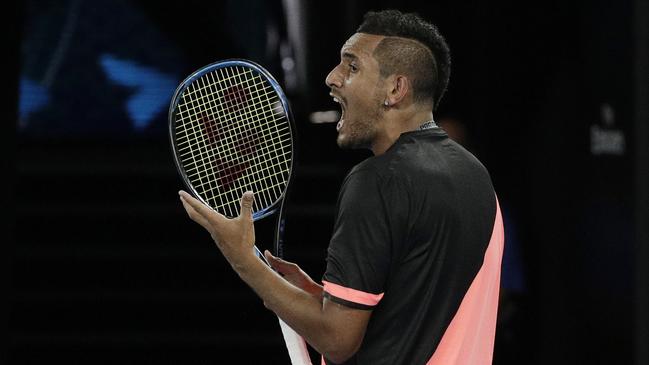 Australia’s Nick Kyrgios yells in frustration during his tense fourth-round loss to Bulgaria’s Grigor Dimitrov on Rod Laver Arena last night. Picture: AP