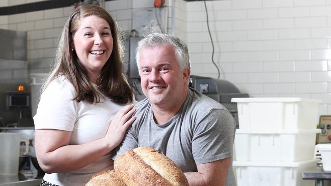 Emma and Jay Patey, owners of Hobart’s Pigeon Whole Bakers, love being situated in the old <i>Mercury </i>press site in Argyle St. Picture: LUKE BOWDEN