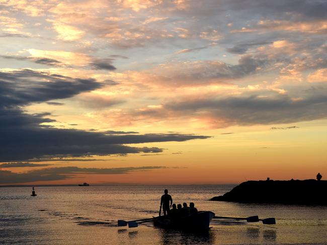 Surf boat training at Williamstown beach this morning. Picture: Nicole Garmston