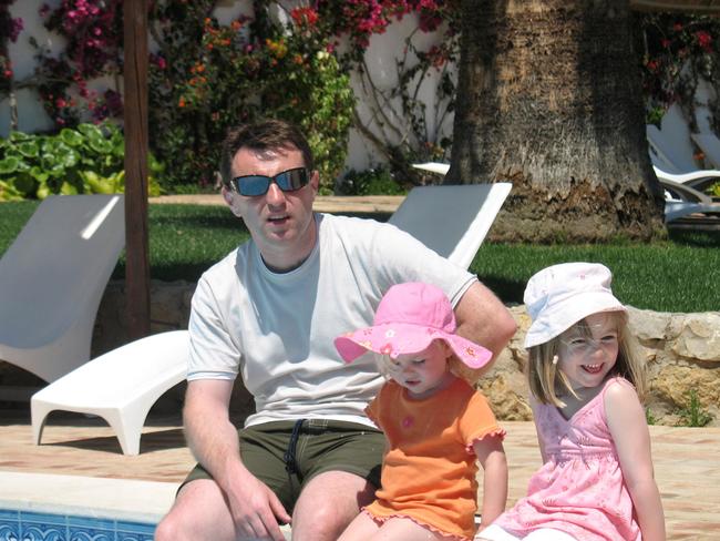 Madeleine McCann (right) with her father Gerry and sister Amelie in a photograph taken just eight hours before she disappeared from the Praia da Luz resort in Portugal on May 3, 2007. Picture: File