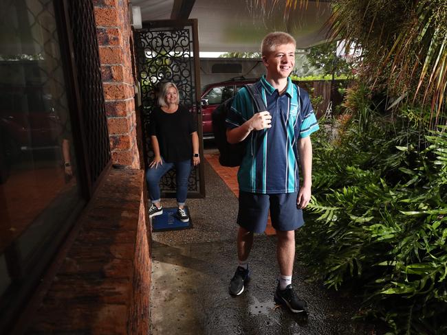 Year 10 student Tasman Lisle ready to head off to school at King's Christian College Reedy Creek with mum  Nicole Jones looking on. Picture: Glenn Hampson.