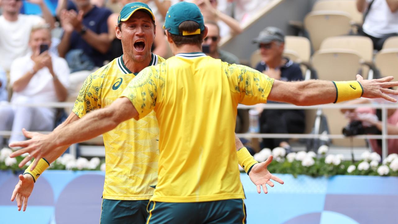 Matthew Ebden and John Peers of Team Australia celebrate match point. Picture: Matthew Stockman/Getty Images