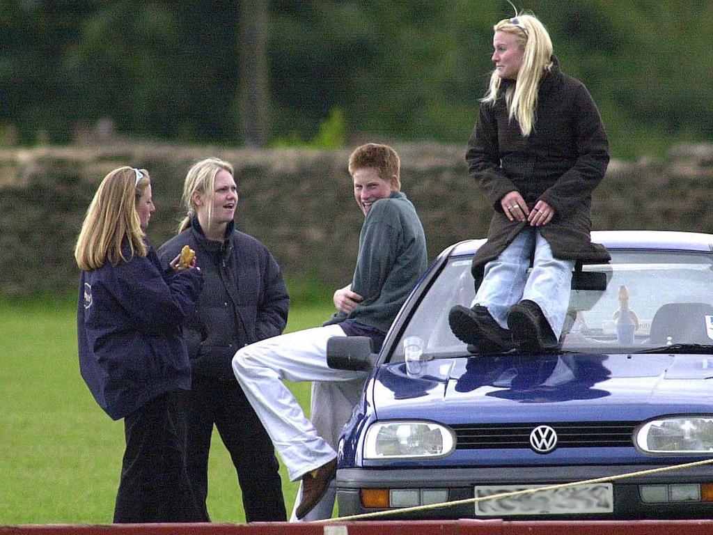 Sasha Walpole, second from left, with Prince Harry and friends in June 2001 at the Beaufort Polo Club in Gloucestershire, weeks before her encounter with the royal. Picture: Getty