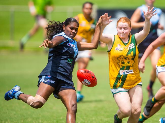 Darwin Buffettes’Ashanti Bush puts boot to ball against St Mary’s. Photo: Che Chorley