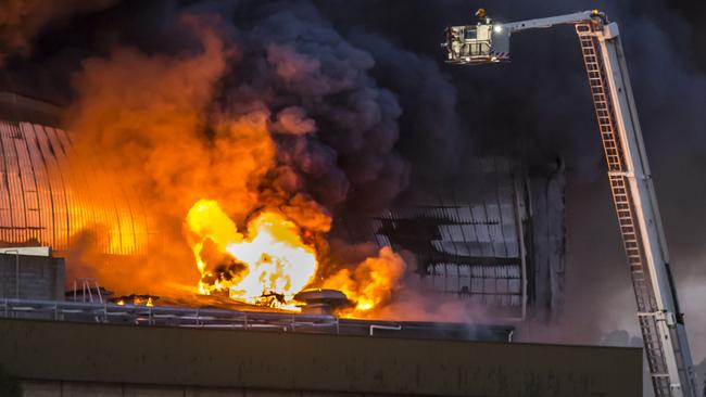 Firefighters tackle the fire at Thomas Foods, Murray Bridge. Picture: Jesse Barnes from JGJ Photography Australia