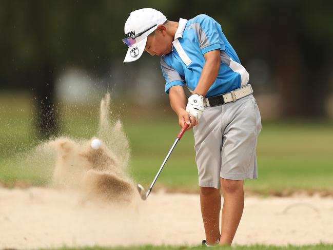 Jonathan Hong practises his swing at the Barnwell Park Golf Club in Five Dock. Picture: Brett Costello