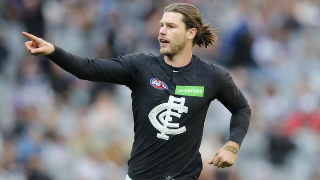 Bryce Gibbs celebrates a goal in Carlton’s upset win over Collingwood.