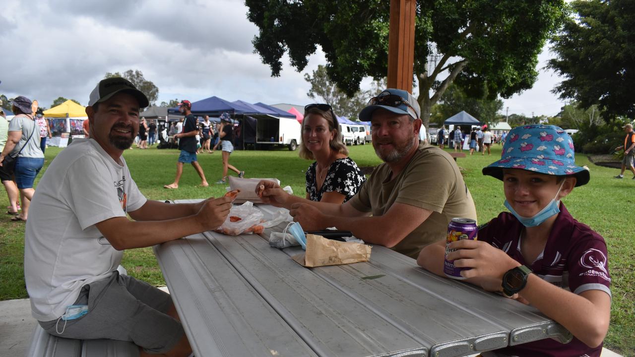 HOWARD EASTER MARKETS: (L) Grant Hartman, Rachel Hartman, Shaun Hartman and Liam Hartman enjoy a morning tea of prawns at the Howard Easter Markets. Photo: Stuart Fast