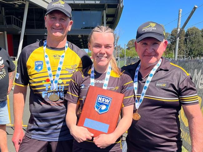 Mounties celebrate their premiership win (from left) Gary Hart, Brooke Wilkins and Mick Daley. Picture: Contributed