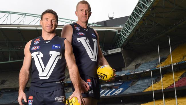 North Melbourne legend Brent ‘Boomer’ Harvey and Essendon great Dustin Fletcher. Picture: Tony Gough