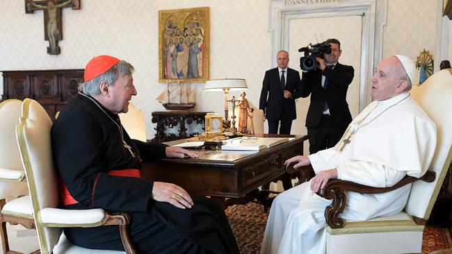 Pope Francis, right, speaks with Cardinal George Pell in October after the Australian’s return to the Vatican following his acquittal on sexually abusing boys. Picture: Vatican Media/AFP