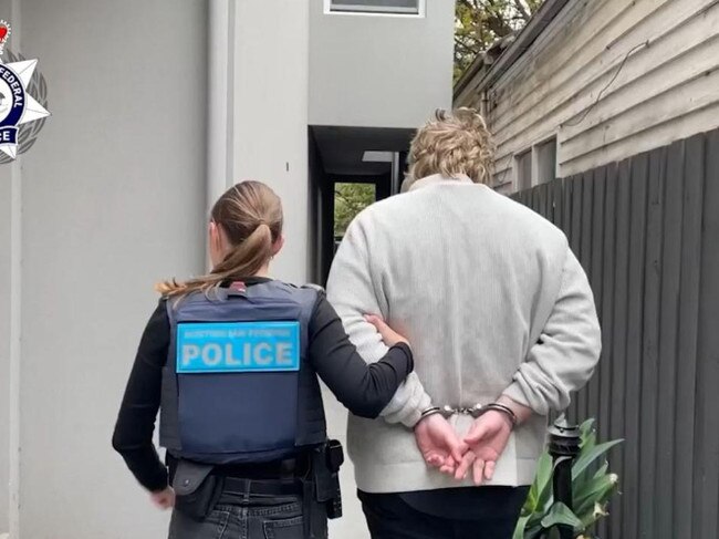 Mr Prosser after he was arrested by the AFP.