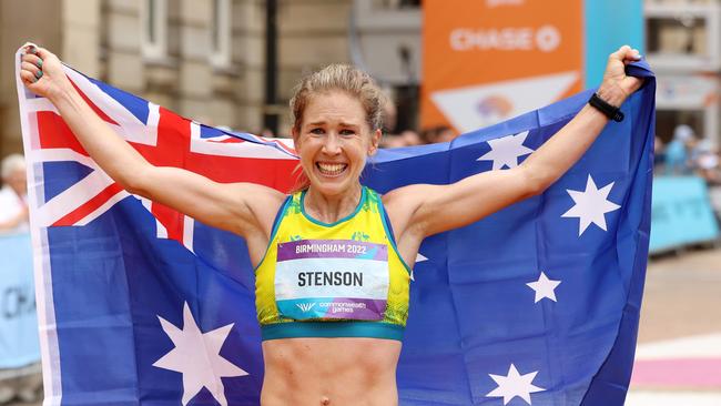 BIRMINGHAM, ENGLAND - JULY 30: Gold Medalist, Jessica Stenson of Team Australia celebrates with their flag after finishing first in the Women's Marathon on day two of the Birmingham 2022 Commonwealth Games at Smithfield on July 30, 2022 on the Birmingham, England. (Photo by Mark Kolbe/Getty Images)