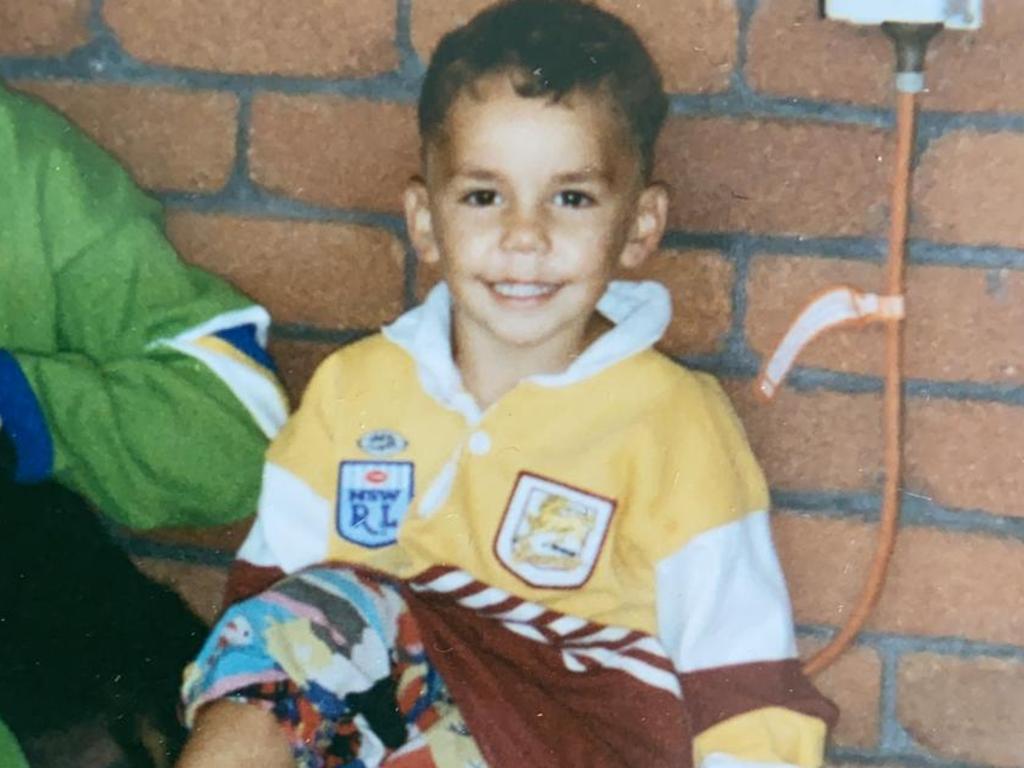 James in a Broncos jersey as a child.