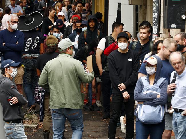 Sydney residents in Darlinghurst lining up at Centrelink in March. In just three months, an extra 205,000 joined the dole queue.