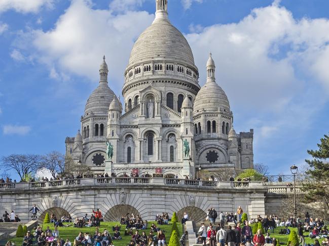 Paris: Tourists on the hillside of Montmartre on the background of the Sacre-Coeur basilica. The beginning of April. Paris, France. Photo: istockEscape 11 May 2025Take a Tour