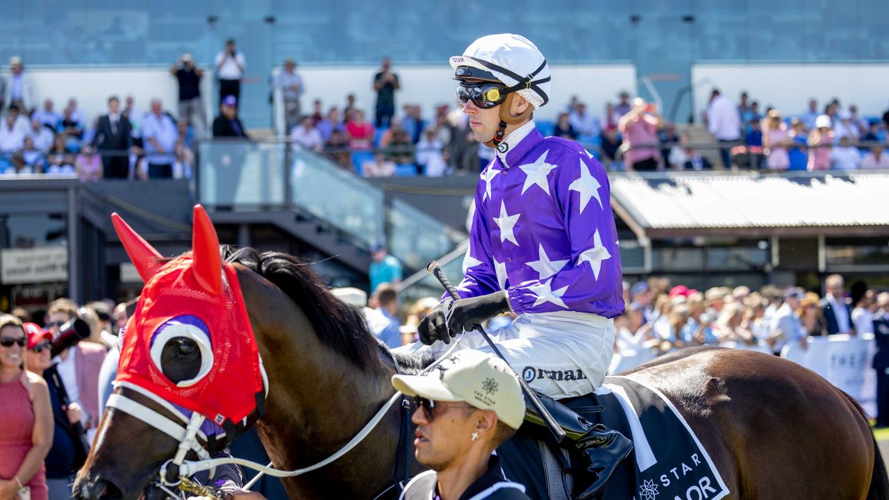 Action at Magic Millions race day. Picture: Luke Marsden.