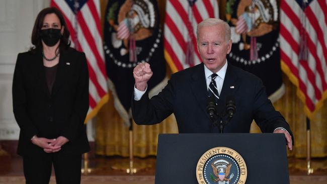 US President Joe Biden speaks about his administration's social spending plans, as US Vice President Kamala Harris looks on, from the East Room of the White House in Washington, DC. Picture: AFP