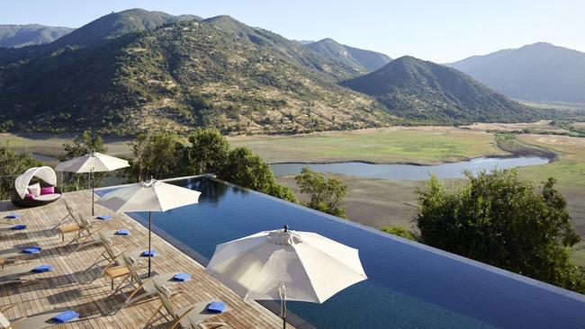 The pool at Vina Vik Millahue offers sweeping regional views.