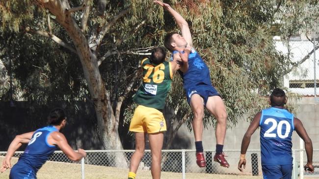 Rovers ruckman Geordie Lelliott gets the jump on Pioneer opponent David Bray at the centre bounce. Cameron Ilett, left and Baydon Ngalkin (20) are the other Rovers players. Picture: ALECIA CLARKE