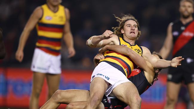 Young Crow Sam Berry is tackled by Archie Perkins. Picture: Michael Klein