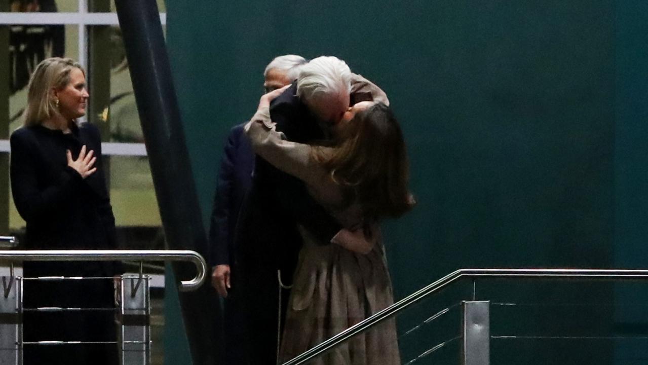 Julian Assange kisses his wife Stella Assange as he arrives at Canberra Airport. Picture: Lisa Maree Williams/Getty Images