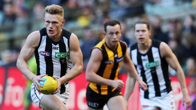 AFL Round 15. Hawthorn vs. Collingwood at the MCG. Collingwood's Adam Treloar runs forward . Pic: Michael Klein