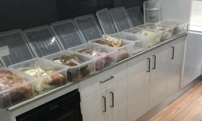 She spends two full days cooking for an entire term and ends up with 84 family meals which are packed into boxes. Source: Supplied