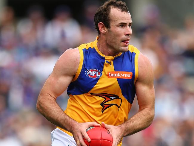 PERTH, AUSTRALIA - JULY 16: Shannon Hurn of the Eagles looks to pass the ball during the round 17 AFL match between the Fremantle Dockers and the West Coast Eagles at Domain Stadium on July 16, 2017 in Perth, Australia.  (Photo by Paul Kane/Getty Images)