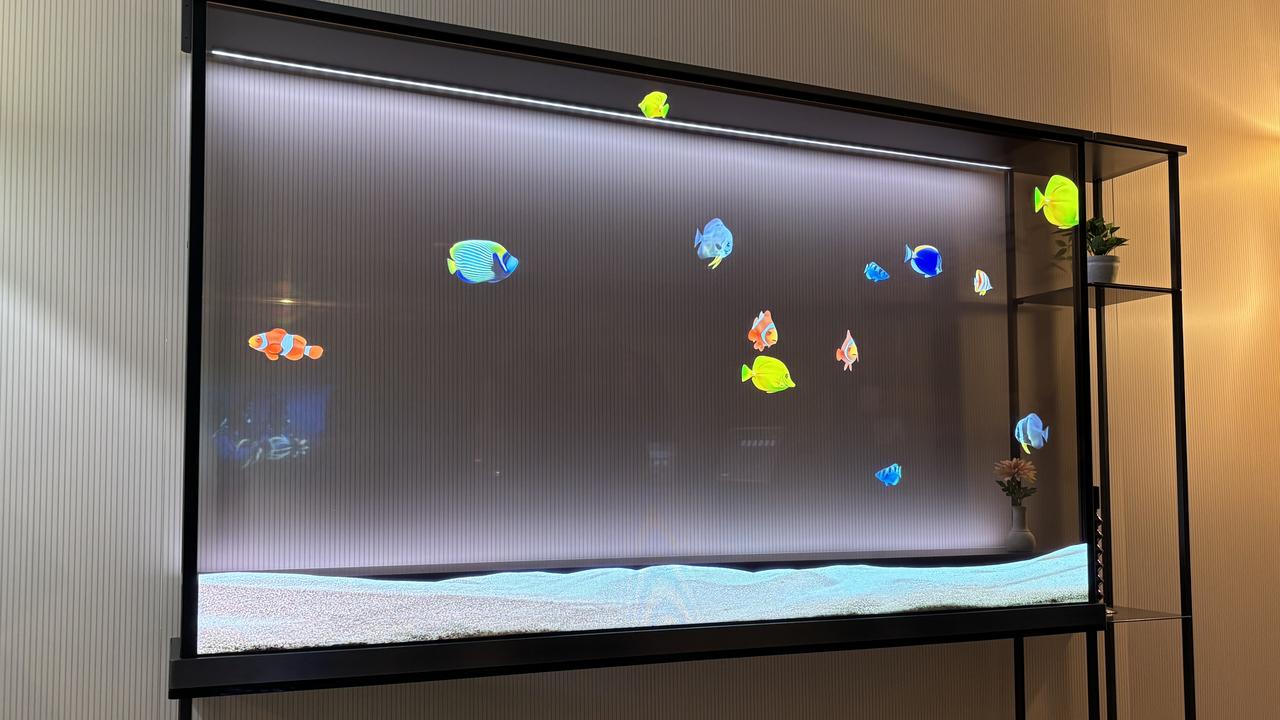 This Impressive LG Transparent OLED TV Transforms Into a Fish Tank - CNET