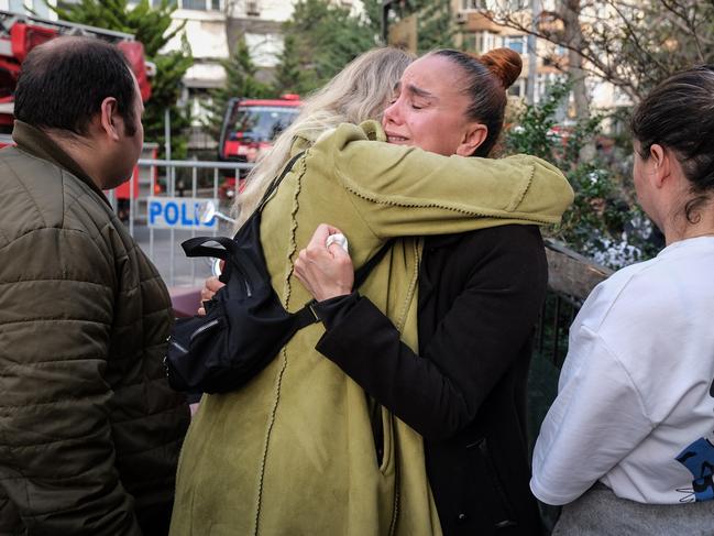 People mourn for loved ones who died after a fire broke out at the Masquerade nightclub in Istanbul, Turkey. Picture: Getty Images