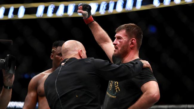 Stipe Miocic reacts after defeating Francis Ngannou by unanimous decision.