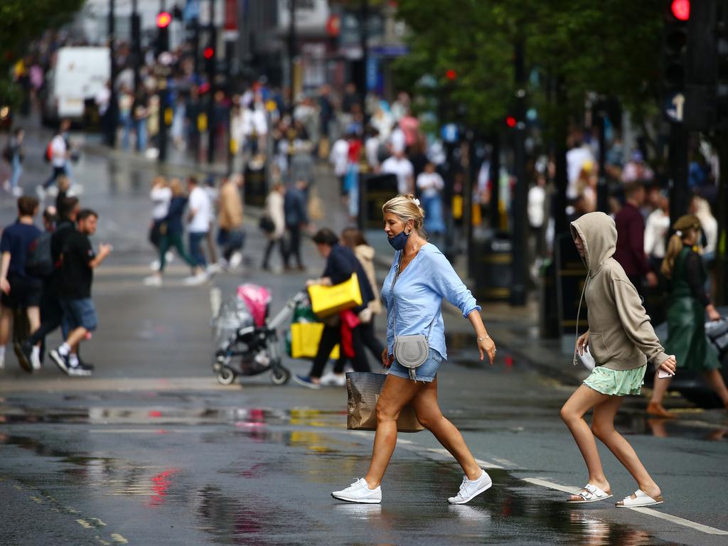 Shoppers cross Oxford Street in London on July 31. Picture: Hollie Adams/Getty Images