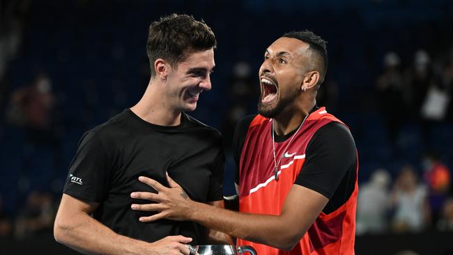 Thanasi Kokkinakis (L) and Nick Kyrgios celebrate after winning last year’s Australian Open doubles title. Picture: Getty