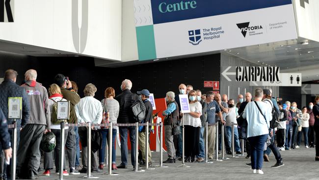 People queue for vaccinations in Melbourne. Picture: NCA NewsWire / Andrew Henshaw