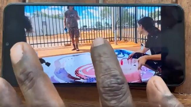 A video still from footage obtained during The Australian’s investigation into alleged interference of Indigenous art by white gallery staff at Tjala Arts Centre. Picture: The Weekend Australian