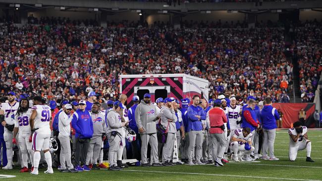 Buffalo Bills players look on after teammate Damar Hamlin collapsed on the field. Picture: Dylan Buell/Getty