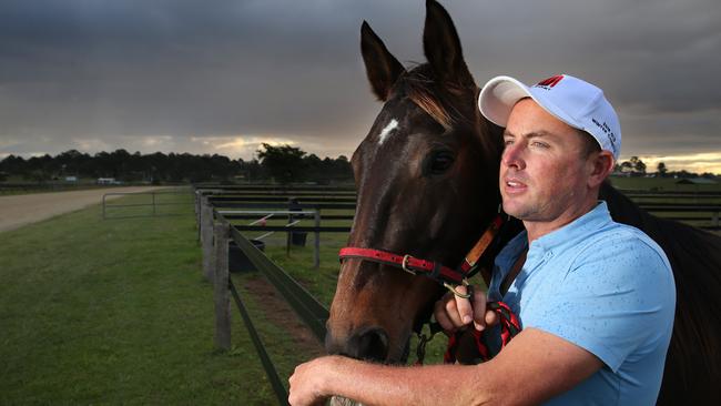 Scott Miller with 'Bettor Than Special' at Raboki Farm in Logan Reserve. Picture: Richard Walker