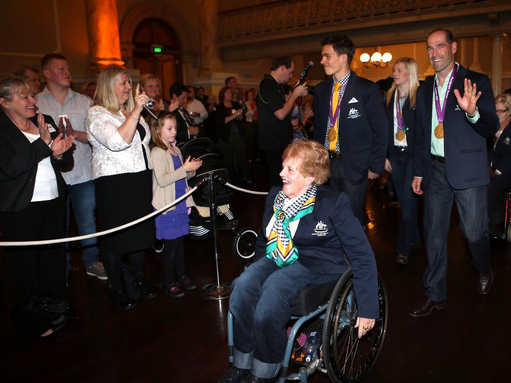 Libby Kosmala followed by Kieran Modra and Scott McPhee at a Civic Reception for London 2012 Paralympic Games athletes at the Adelaide Town Hall.