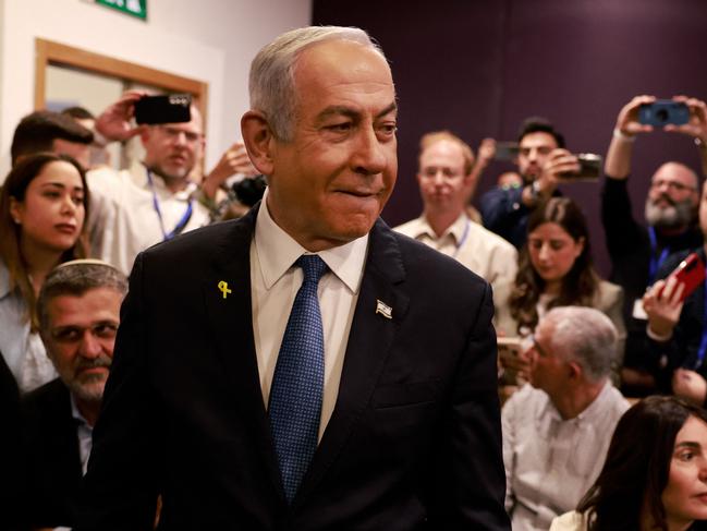 Israeli Prime Minister Benjamin Netanyahu arrives at the district court in Tel Aviv for his hearing on corruption charges on Tuesday. Picture: AFP